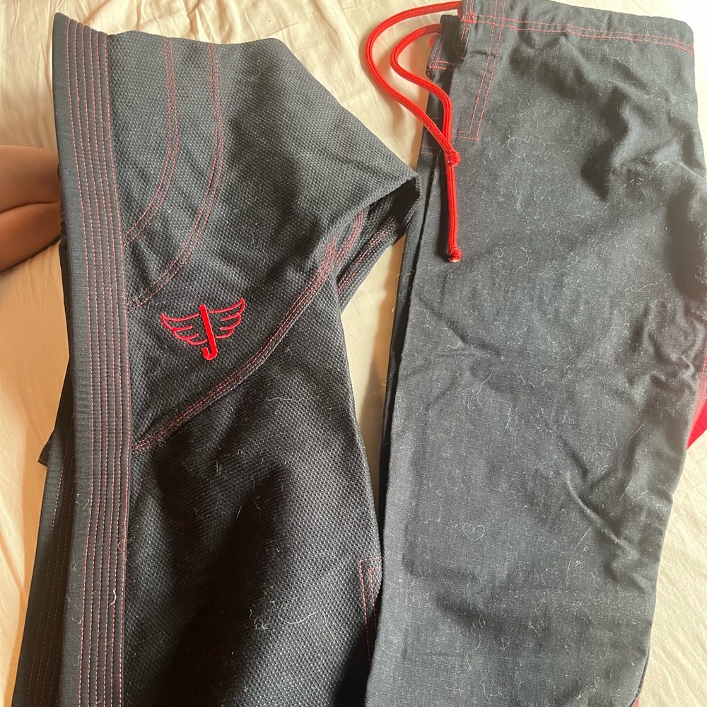 Black Martial Arts Gi with Red Accents